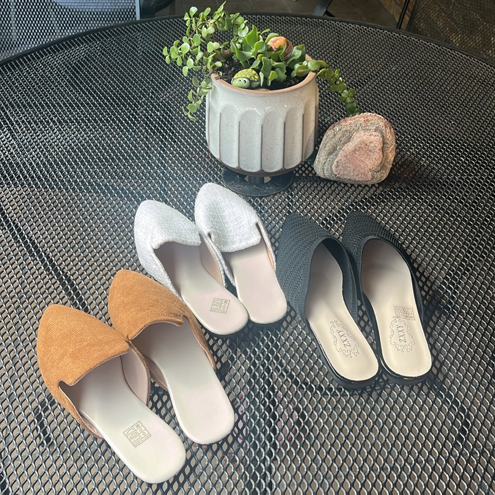 Black, White, and Tan flats